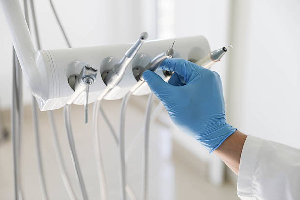 Professional Root Canal Treatment technician working in Huntsville, AR
